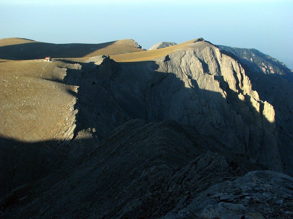 A remote mountain refuge stands on the edge of the high Plateau of the Muses on Mount Olympus.